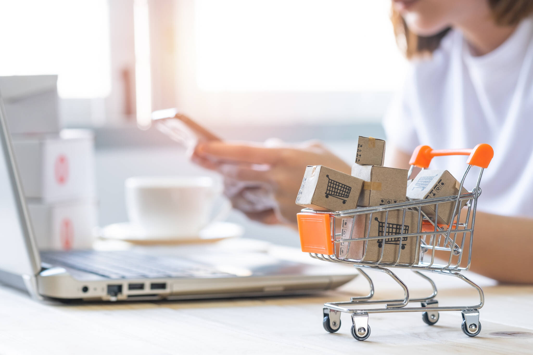 Shopping Cart With Paper Box Or Parcel With Blur Background Woma